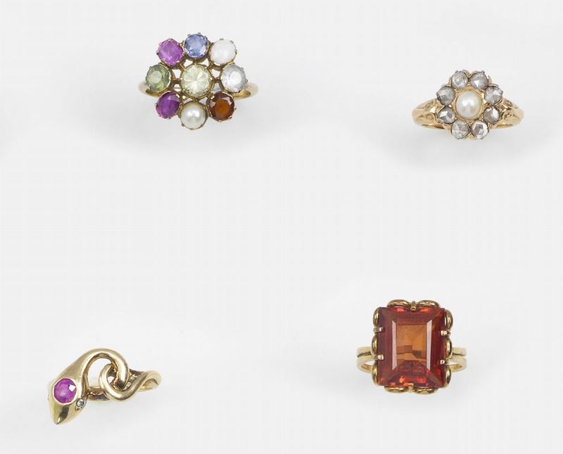Lot composed by four gold and gem-set rings (one with a synthetic corundum)  - Auction Fine Art - Cambi Casa d'Aste
