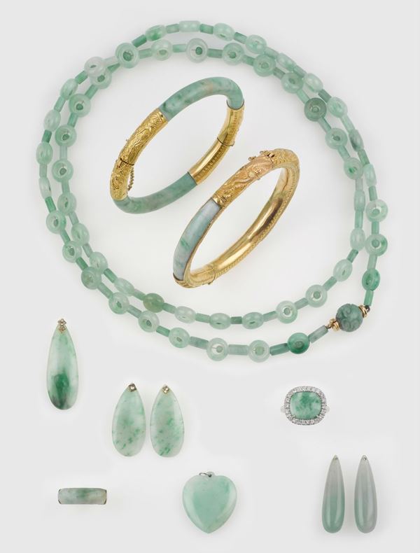 A group of jadeite including two bangles, one necklace, two rings, a pair of earrings and two drops