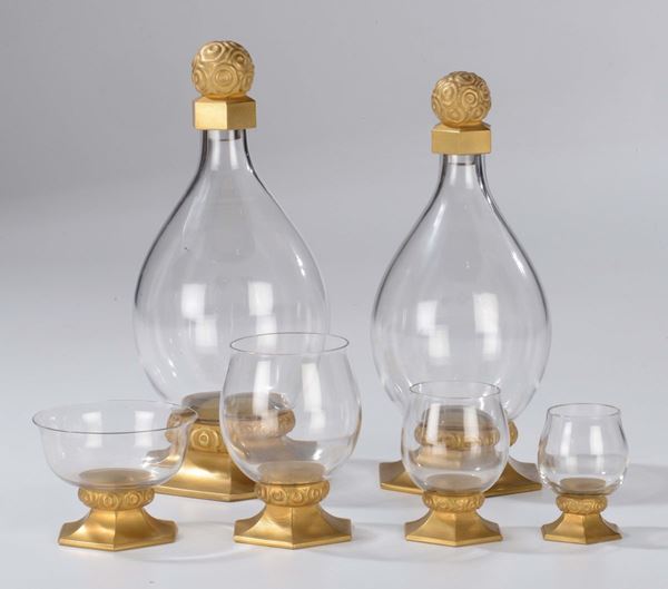 Servizio di bicchieri in vetro e vetro dorato