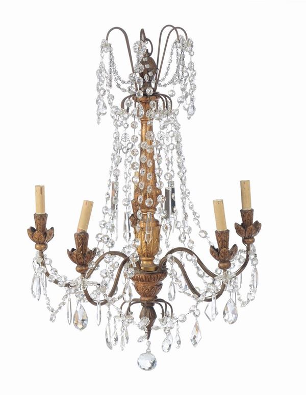 Tre lampadari in stile Luigi XVI in legno dorato e cristallo, XIX secolo