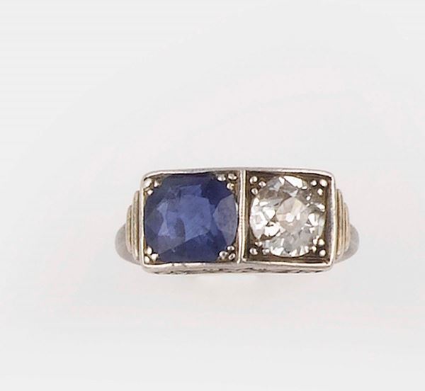 Old-cut diamond and a Sri Lanka sapphire ring. No indication of heating (NTE)