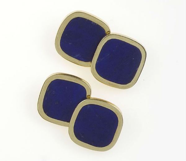 A pair of gold and lapis lazzuli cufflinks