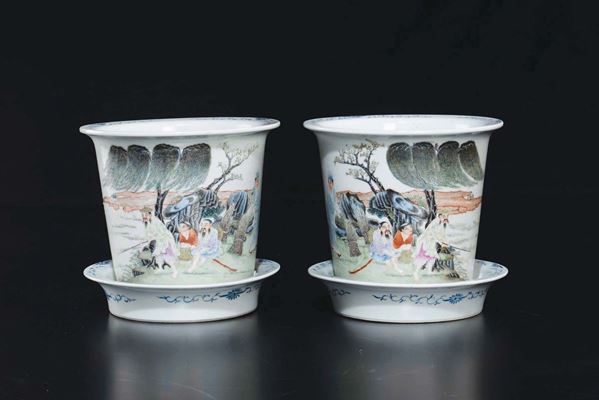 A pair of polychrome enamelled porcelain jardinières with fishermen, China, early 20th century