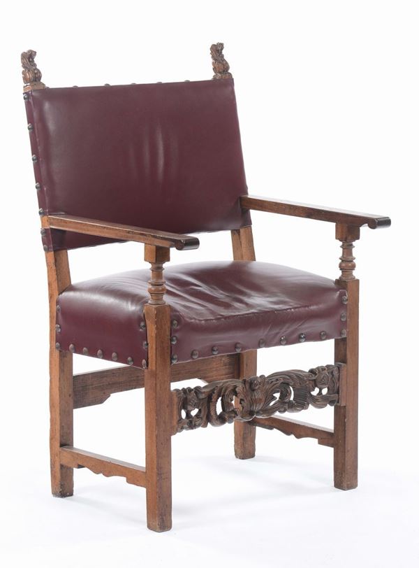 Poltrona in legno con seduta e schienale in pelle