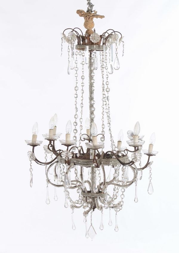 Lampadario a dieci luci in metallo e cristalli