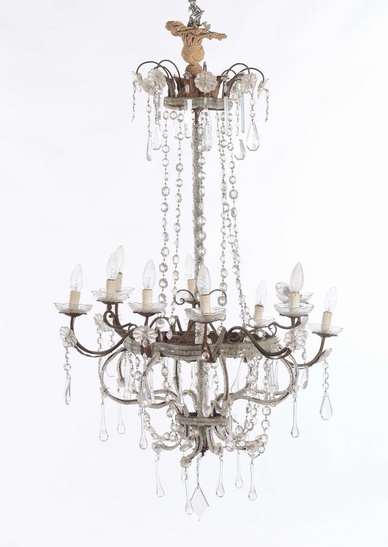 Lampadario a dieci luci in metallo e cristalli  - Asta Antiquariato - Cambi Casa d'Aste