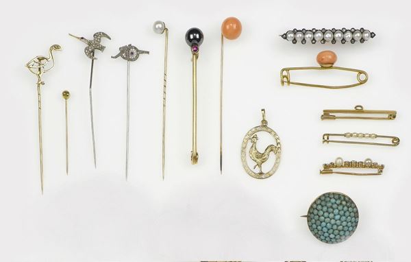 Collection of tie pins and one pendant
