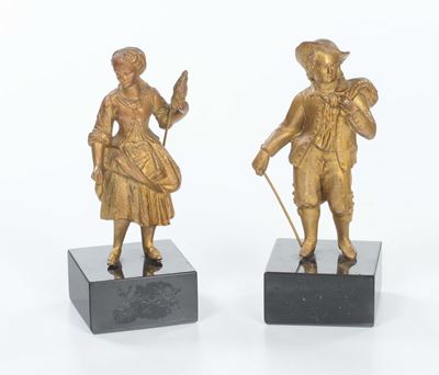 Due Sculture in Bronzo Dorato Raffiguranti Figure, XX Secolo