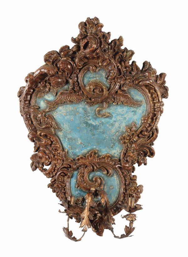 Tre ventoline in legno intagliato e laccato, XVIII secolo