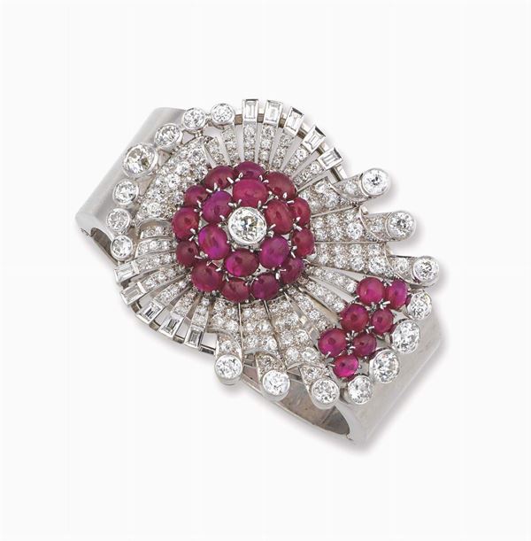 An Art Deco platinum, ruby and diamond bangle