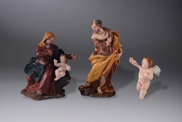 Sacra famiglia in terracotta e gesso policromo composta da Madonna, San Giuseppe, Bambin Gesù e angioletto, Emila XVII-XVIII secolo
