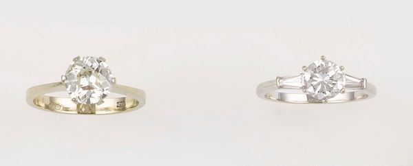 A group of two solitaire rings
