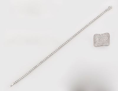 Lotto Composto da un Anello con Pavé di Diamanti ed un Bracciale Tennis di Ct 3,00 Circa
