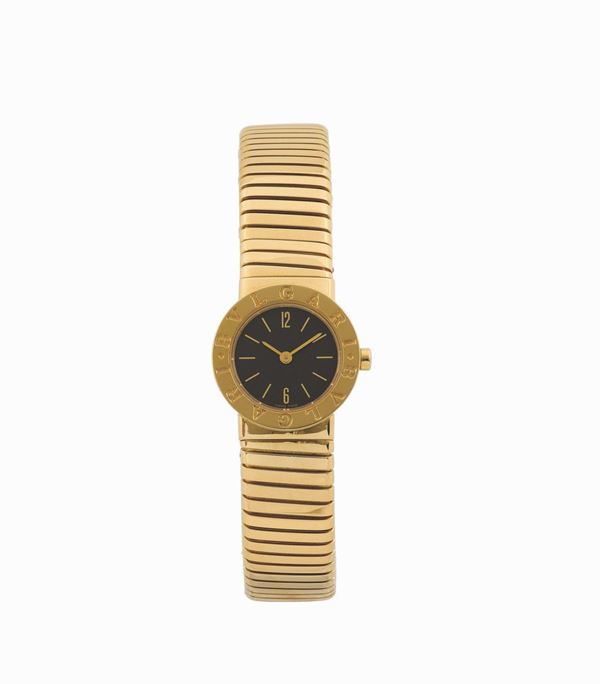 BULGARI, Tubogas Bulgari, No. P.130232, Ref. BB 23  2T, water-resistant, 18K yellow gold lady’s quartz wristwatch with an integral 18K yellow gold bulgari “tubogas” bangle bracelet. Made in the 1990's.
