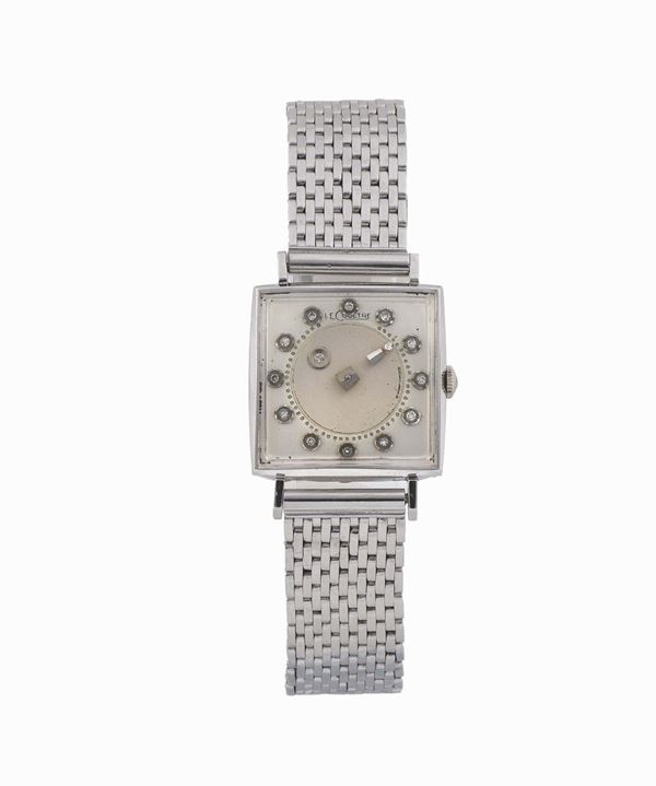 LECOULTRE, Mysterieuse, 14K white gold square wristwatch with diamonds and a white gold bracelet. Made in the 1960's