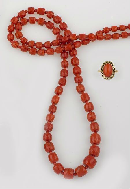 A coral neckalce and a coral ring.