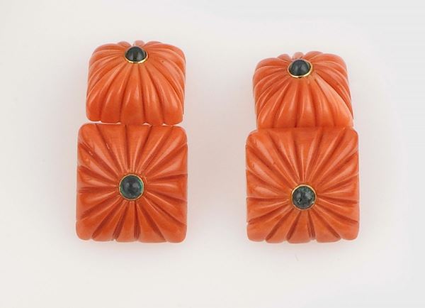 A pair of carved coral cufflinks