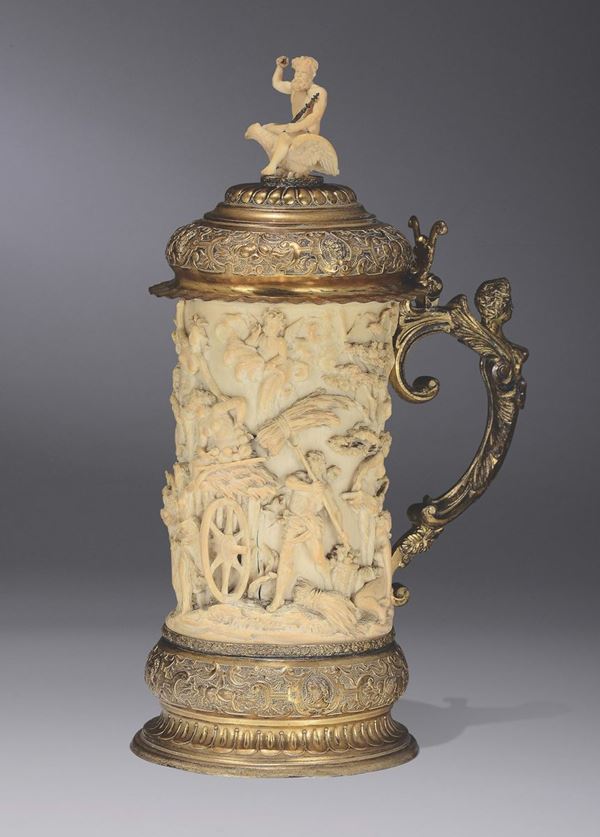 A bronze-gilt ivory tankard. German or French manufacture (Dieppe?), 19th century