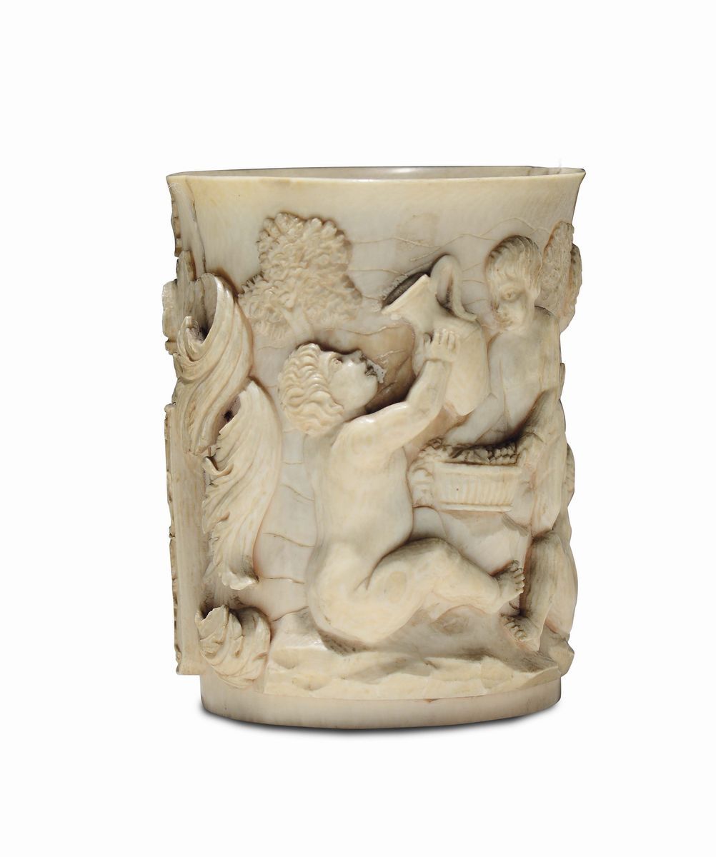 Elemento di Boccale in Avorio Scolpito Ad Altorilievo con Raffigurazione di Putti e Sileni che Ve...