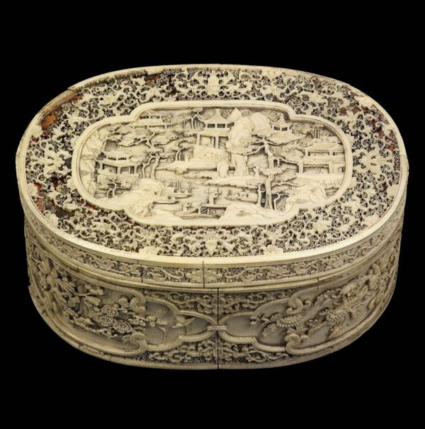A carved ivory box and cover with naturalistic and landscapes reserves, China, Qing Dynasty, 19th century