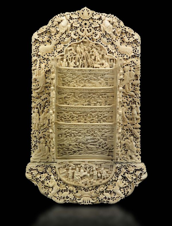A carved ivory paper holder with flowers, animals and common life scenes in relief, China, Qing Dynasty, 19th century