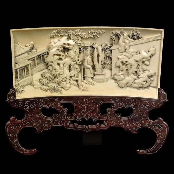 A carved ivory plaque with court life scene, China, Qing Dynasty, 19th century