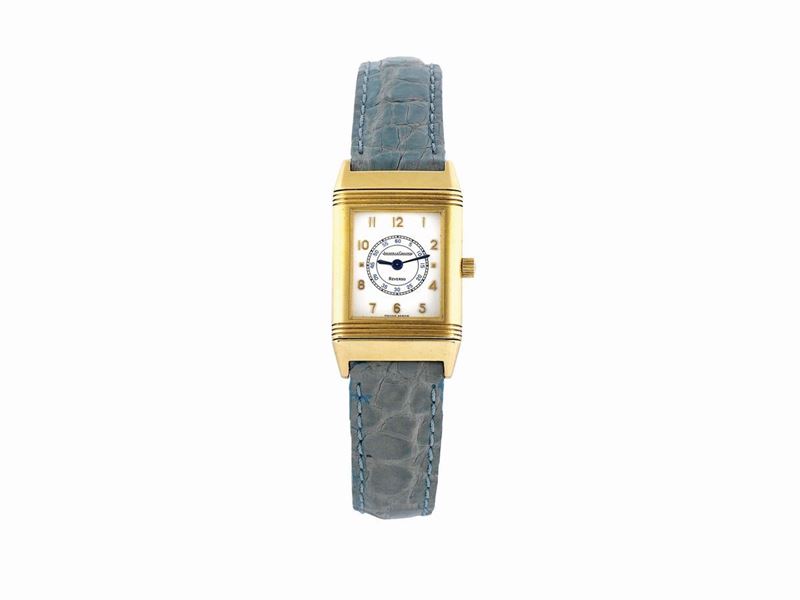 JAEGER-LeCOULTRE, “Reverso”, case No. 1646738, Ref. 260.1.08, elegant, rectangular, 18K yellow gold lady’s reversible quartz wristwatch. Made in the 2000's.  - Auction Watches and Pocket Watches - Cambi Casa d'Aste
