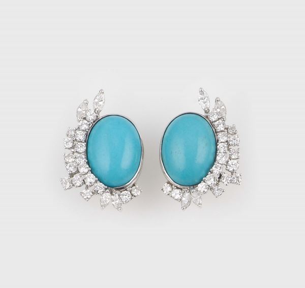 A pair of diamond and turquoise earrings