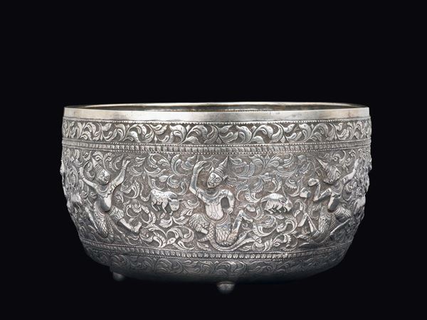 An embossed silver bowl with dancing figures, India, 19th century