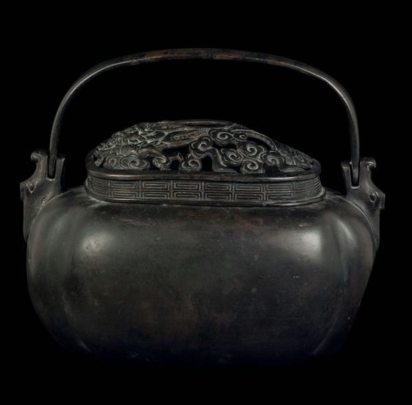 A bronze hand warmer, China, Ming Dynasty, 17th century