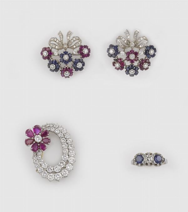 A group including three brooches and one ring with diamond, ruby and sapphire