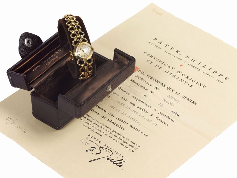 PATEK PHILIPPE, Geneve, Albonico Biella, movimento No. 946202, Ref. 3087/1, orologio da polso, da donna, in oro giallo 18K con bracciale in oro Patek Philippe. Accompagnato da scatola originale e Certificato. Realizzato nel 1950 circa  - Asta Orologi da Polso e da Tasca - Cambi Casa d'Aste