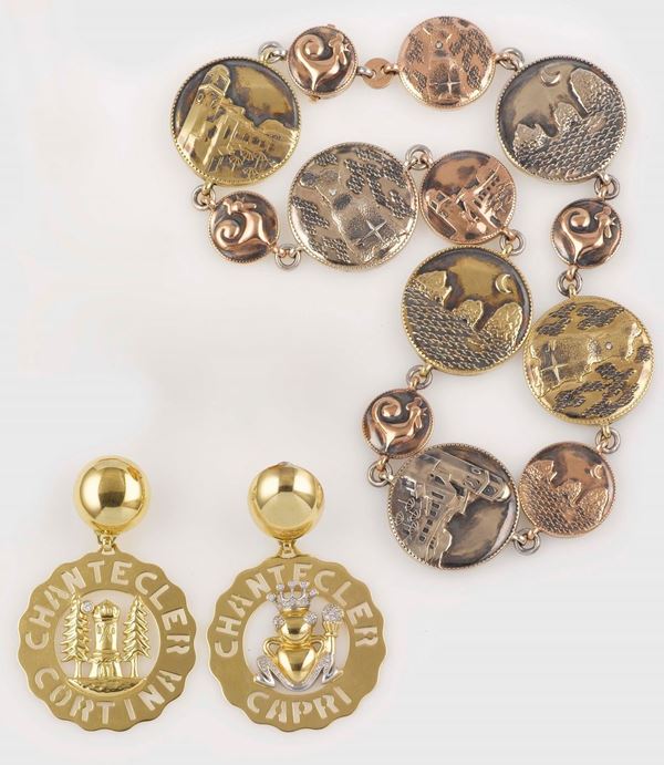 A group including a pair of gold earrings and a silver gilt necklace. Chantecler