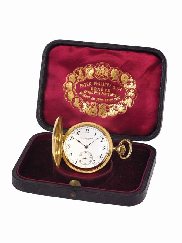 PATEK PHILIPPE & Cie, Geneve, movement No. 106009, case No. 221123, 18K yellow gold, hunting case keyless pocket watch with an 18K yellow gold chain. Accompanied by the original box. Made circa 1900