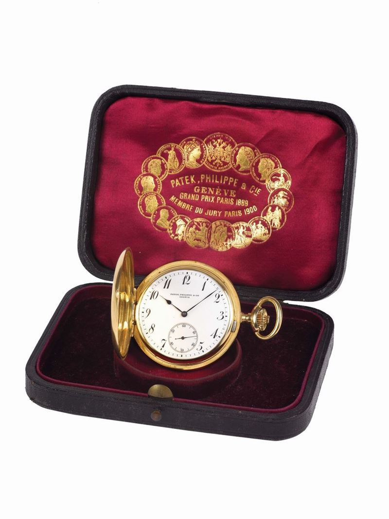 PATEK PHILIPPE & Cie, Geneve, movement No. 106009, case No. 221123, 18K yellow gold, hunting case keyless pocket watch with an 18K yellow gold chain. Accompanied by the original box. Made circa 1900  - Auction Watches and Pocket Watches - Cambi Casa d'Aste
