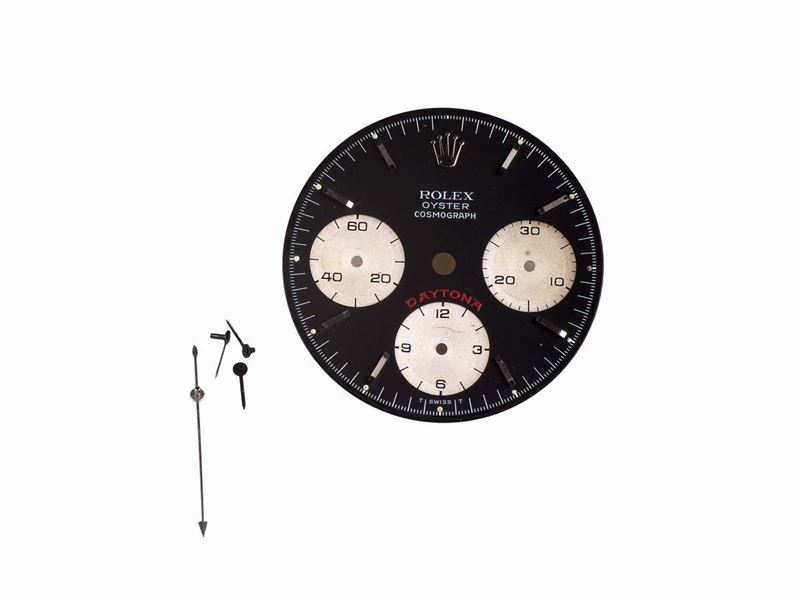 ROLEX QUADRANTE CON SFERE  Oyster Cosmograph Daytona, Ref. 6263, in acciaio, bi-colore, argento e nero con indici in acciaio a bastone, contatori per i secondi, ore e minuti, divisione minuti/secondi esterna, SCRITTA DAYTONA IN ROSSO, parte posteriore firmata Singer. OTTIME CONDIZIONI  - Asta Orologi da Polso e da Tasca - Cambi Casa d'Aste