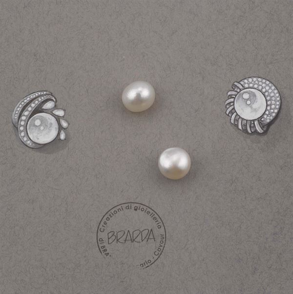 A pair of natural unmounted pearls. CISGEM reports