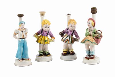 Bassano, basi di lampada in terraglia a colaggio con decoro a smalti, figure di bambini (anni 193...