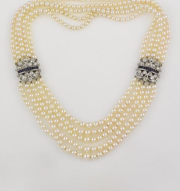 Collana cinque fili di perle con clips di diamanti e zaffiri