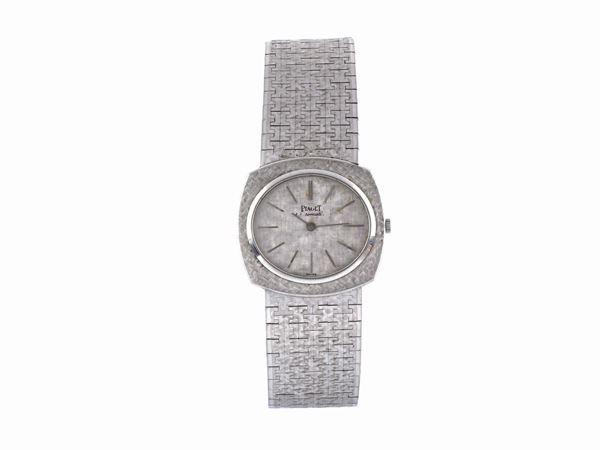 PIAGET, case No. 12441A3, Ref. 74383, 18K white gold, self-winding wristwatch with an 18K white gold bracelet and deployant clasp. Made circa 1970