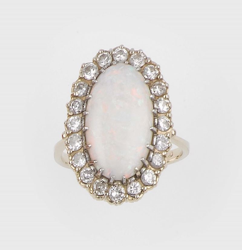 An opal and diamond ring  - Auction Jewels - II - Cambi Casa d'Aste