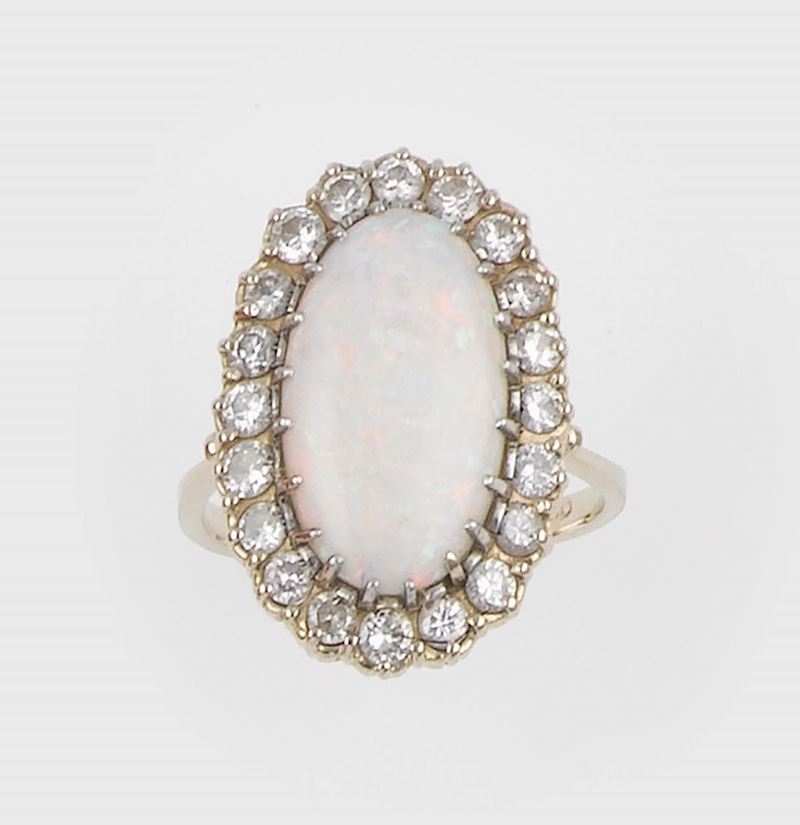 An opal and diamond ring  - Auction Jewels - II - Cambi Casa d'Aste