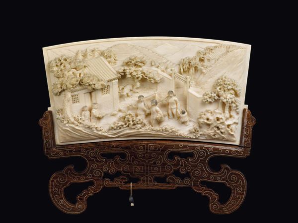 A carved ivory plaque with a common children life scene, China, Qing Dynasty, 19th century