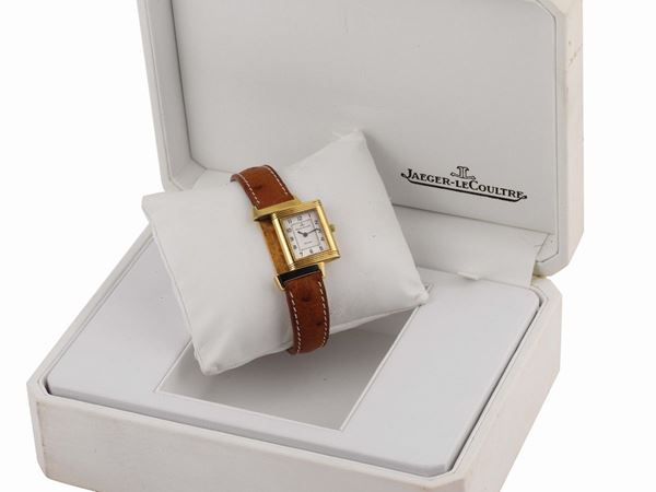 JAEGER LECOULTRE, Reverso, Re. 260108, 18K yellow gold lady's quartz wristwatch. Accompanied by the original box and Guarantee. made in the 1990's.
