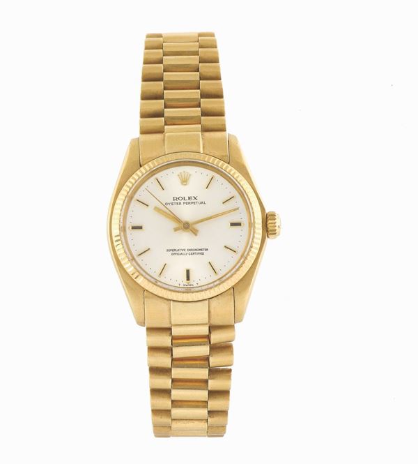 ROLEX, “Oyster Perpetual, Superlative Chronometer, Officially Certified”, Ref. 6751, case No. 6204398, tonneau-shaped, center seconds, self-winding, 18K yellow gold  wristwatch with an 18K yellow gold  Rolex President bracelet with deployant clasp. Accompanied by the original box. Made circa 1980