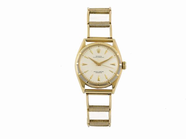 ROLEX, Honeycomb Dial, Oyster Perpetual, Officially Certified Chronometer, case No. 793921, Ref. 6085, tonneau-shaped, center-seconds, self-winding, water-resistant, 18K yellow gold wristwatch with  an 18k yellow gold bracelet.  Made circa 1953.