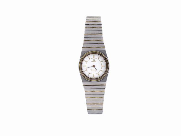 OMEGA, Constellation, movement No. 42747921, stainless steel and gold lady's quartz wristwatch with bracelet. Accompanied by the original box and Guarantee.  Made circa 1980