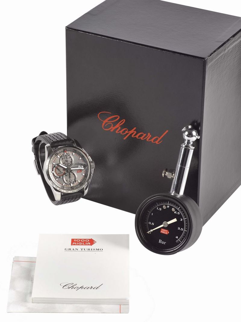 CHOPARD, Genève, Mille Miglia - GTXL - Gran Turismo XL - Competitor Edition 214, Certified Chronometer, case No. 1245051,  Ref. 8489. Made for the Brescia - Ferrara - Roma classic car race, self-winding, water-resistant,  stainless steel wristwatch with square button chronograph, registers, date, tachometer bezel and a black rubber tyre-tread strap with stainless steel Chopard buckle. Accompanied by the original box, instruction booklet, Certificate and a car manometer  - Auction Watches and Pocket Watches - Cambi Casa d'Aste