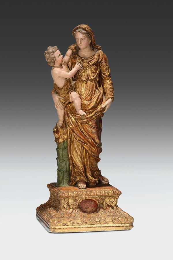 Scultura reliquiario in stucco policromo e dorato raffigurante Madonna con Bambino. Plasticatore attivo a Roma e Venezia nella metà del XVI secolo