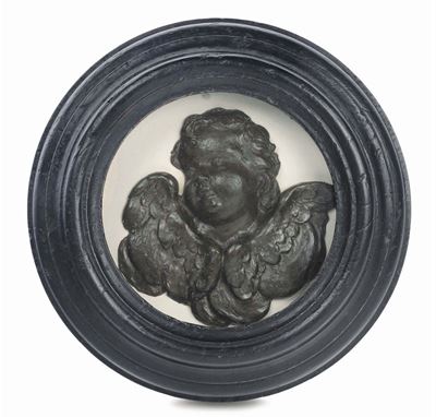 Altorilievo in Cera Monocroma Marrone Raffigurante Cherubino Entro Cornice in Legno Ebanizzato, I...